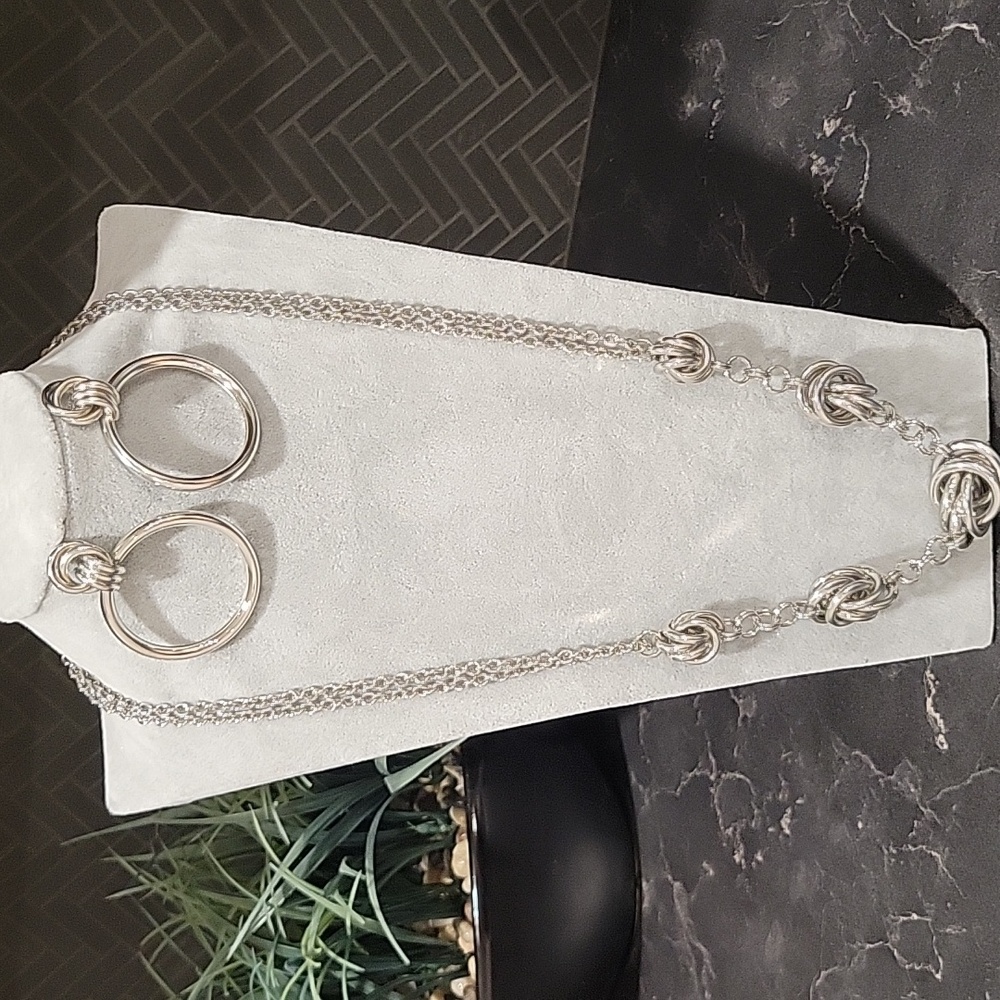 Silvertone Knotted Hoops Necklace And Earrings Set